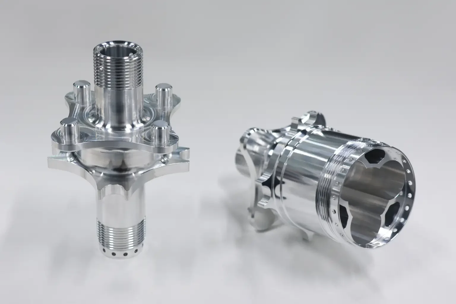Precision multi-axis CNC machining center processing critical aluminum and stainless steel packaging equipment parts